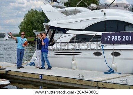 DOLGOPRUDNY, MOSCOW REGION, RUSSIA - JULY 4, 2014: People on the 5th Yachts and Boats Fair 