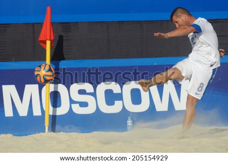 MOSCOW, RUSSIA - JULY 13, 2014: Theofilos Triantafyllidis of Greece performs the corner kick in the match with Belarus during Moscow stage of Euro Beach Soccer League. Belarus won 6-5