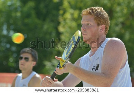 MOSCOW, RUSSIA - JULY 17, 2014: Men team Belgium in the match with Greece during ITF Beach Tennis World Team Championship. France won in two sets