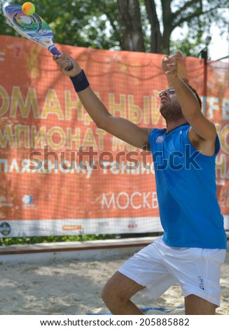 MOSCOW, RUSSIA - JULY 17, 2014: Giorgos Martinis of Greece in the match against France during ITF Beach Tennis World Team Championship. France won in two sets