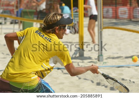 MOSCOW, RUSSIA - JULY 16, 2014: Vinicius Font of Brazil on the training before the ITF Beach Tennis World Team Championship. Russia hosts the championship for the third time