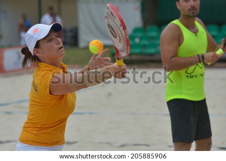 MOSCOW, RUSSIA - JULY 17, 2014: Mixed team Bulgaria in the match with San Marino during ITF Beach Tennis World Team Championship. San Marino won the round 3-0