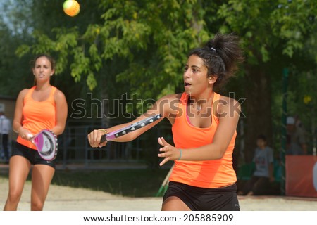 MOSCOW, RUSSIA - JULY 17, 2014: Women team Cyprus in the match with Switzerland during ITF Beach Tennis World Team Championship. Switzerland won the match 5-7, 6-2, 6-1