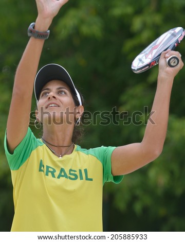 MOSCOW, RUSSIA - JULY 17, 2014: Joana Cortez of Brazil on the training before the ITF Beach Tennis World Team Championship. Russia hosts the championship for the third time