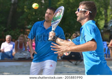 MOSCOW, RUSSIA - JULY 17, 2014: Men team France in the match with Greece during ITF Beach Tennis World Team Championship. France won in two sets