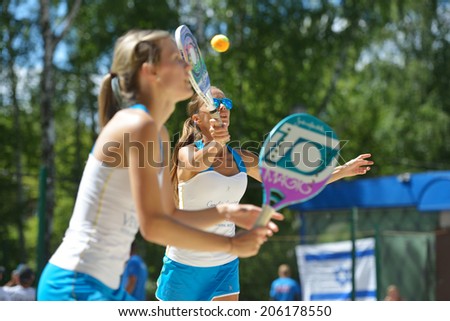 MOSCOW, RUSSIA - JULY 20, 2014: Woman double of Latvia in the match against Bulgaria during ITF Beach Tennis World Team Championship. Bulgaria won in two sets