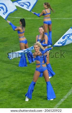 MOSCOW, RUSSIA - JULY 21, 2014: Cheer-dance group Dynamite on the Opening Ceremony of the International soccer tournament Lev Yashin VTB Cup. The group supports the FC Dynamo Moscow