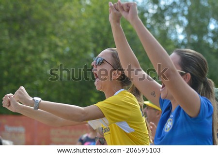 MOSCOW, RUSSIA - JULY 19, 2014: Brazil team supports the man double in the match against Spain during ITF Beach Tennis World Team Championship. Brazil won in two sets