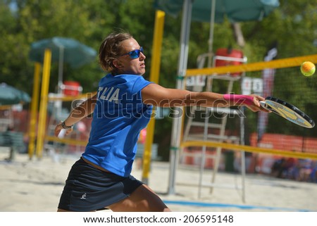 MOSCOW, RUSSIA - JULY 19, 2014: Eva DÃ?Â¢??Elia of Italy in the match against Russia during ITF Beach Tennis World Team Championship. Italy won 2-1