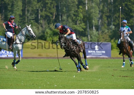 TSELEEVO, MOSCOW REGION, RUSSIA - JULY 26, 2014: Match British Schools - Moscow Polo Club during the British Polo Day. Moscow Polo Club won 7-6