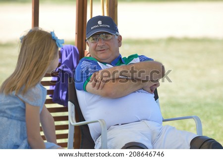 TSELEEVO, MOSCOW REGION, RUSSIA - JULY 26, 2014: Alexis Rodzianko, the President of Moscow Polo Club during the British Polo Day. Tseleevo Golf & Polo Club hosts the event for the second time