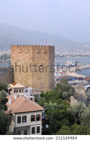 ALANYA, TURKEY - AUGUST 22, 2008: Aerial view to Kizil Kule, Red tower and the port of Alanya. Tower was built in 1226, and now is one of the symbols of Alanya