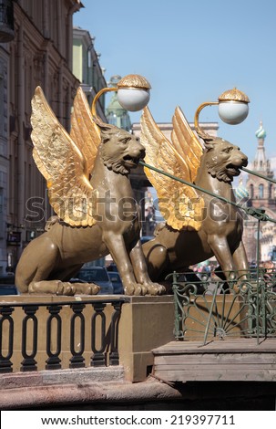 ST. PETERSBURG, RUSSIA - MAY 8, 2012: Winged lions crowning the abutment of the Bank bridge. The bridge across the Griboedov Canal was built in 1826, the sculptures designed by Pavel Sokolov