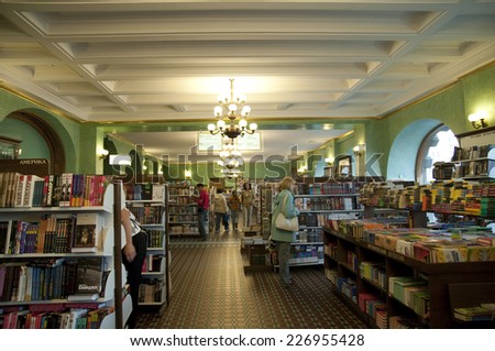 ST. PEPTERSBURG, RUSSIA - JULY 5, 2008: People in the Book House on the Nevsky avenue. The Book House opened in 1919 is the largest book shop of St. Petersburg, and one of the largest in Europe