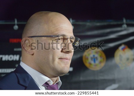 NOVOSIBIRSK, RUSSIA - NOVEMBER 8, 2014: Olympic and World Champion in freestyle wrestling Arthur Taymazov during the Friendship Cup. The competitions include 10 kinds of martial arts