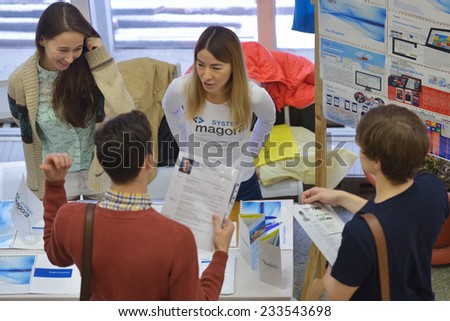 NOVOSIBIRSK, RUSSIA - NOVEMBER 14, 2014: Students of Novosibirsk state university getting information about jobs. The job fair was organized by the NSU Center of graduates