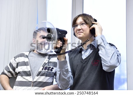 NOVOSIBIRSK, RUSSIA - JANUARY 15, 2015: Student use the directional microphone in the laboratory of information security of the Novosibirsk State University of Economics and Management