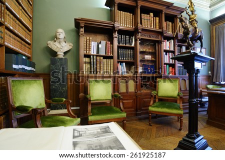 PARIS, FRANCE - SEPTEMBER 14, 2013: Interior of a historical room in the Sorbonne. Found in XIII century as the college, now the Sorbonne University teach more than 50,000 students