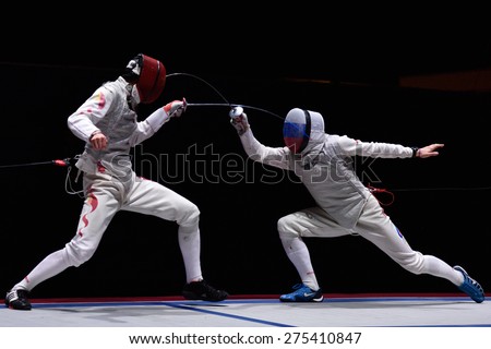 ST. PETERSBURG, RUSSIA - MAY 3, 2015: Final match Russia vs China during 41th International fencing tournament St. Petersburg Foil. The tournament is the stage of FIE World Cup