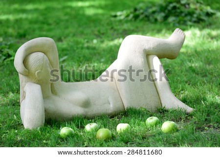 ST. PETERSBURG, RUSSIA - JUNE 4, 2015: Statue Rest At Noon in Mikhailovsky Garden during the festival Emperor\'s Gardens of Russia. The exposition Silk Road Gardens is in focus of festival this year