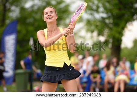 MOSCOW, RUSSIA - MAY 30, 2015: Stanislava Naumova in the match of Russian beach tennis championship. 120 adults and 28 young athletes compete in the tournament