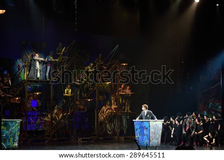 ST. PETERSBURG, RUSSIA - JUNE 19, 2015: Actors perform in a scene from a children's charity project titled Mowgli Generation. The performance is part of the St. Petersburg International Economic Forum