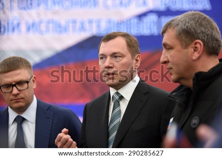ST. PETERSBURG, RUSSIA - JUNE 20, 2015: General director of JSC Russian Grids Oleg Budargin (center) during the presentation of the project of the Federal Test Center for electrical equipment