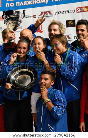 MOSCOW, RUSSIA - JULY 19, 2015: Team Italy with prizes during the Beach Tennis World Team Championship. Italy become world champion, Russia won silver, and Spain got bronze