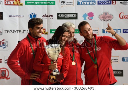 MOSCOW, RUSSIA - JULY 19, 2015: Team Spain with prizes during the Beach Tennis World Team Championship. Italy become world champion, Russia won silver, and Spain got bronze