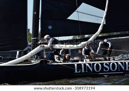 ST. PETERSBURG, RUSSIA - AUGUST 20, 2015: Catamaran of Lino Sonego Team Italia of Italy during the 1st day of St. Petersburg stage of Extreme Sailing Series. Red Bull Sailing Team won the day