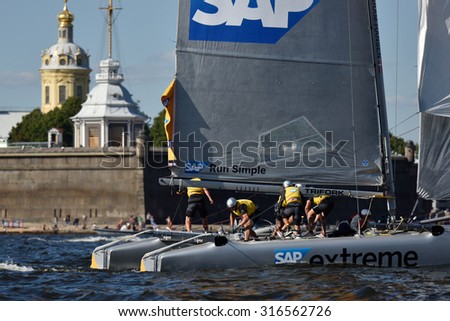 ST. PETERSBURG, RUSSIA - AUGUST 20, 2015: Catamaran of SAP Extreme Sailing Team of Denmark during the 1st day of St. Petersburg stage of Extreme Sailing Series. Red Bull Sailing Team won the day