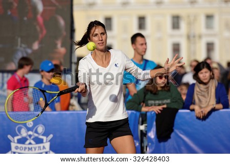 ST. PETERSBURG, RUSSIA - SEPTEMBER 12, 2015: Former professional tennis player Anastasia Myskina in the exhibition match of St. Petersburg Open. The match included in the program of City's Tennis Day.