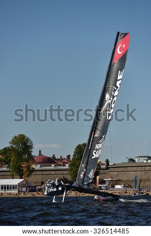 ST. PETERSBURG, RUSSIA - AUGUST 20, 2015: Catamaran of Team Turx of Turkey during 1st day of St. Petersburg stage of Extreme Sailing Series. Red Bull Sailing Team of Austria won the day with 58 points