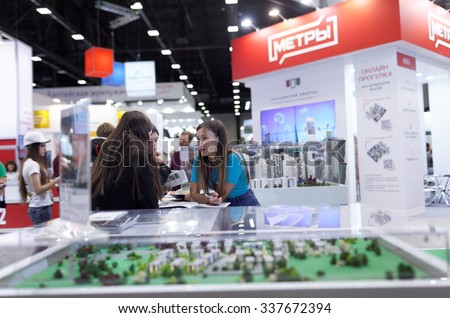 ST. PETERSBURG, RUSSIA - OCTOBER 31, 2015: Visitors in the Expoforum during the Real Estate Fair. It is the largest real estate exhibition in Russia, presenting urban and suburban property