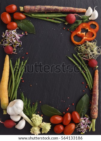 Slate cutting board with vegetables border