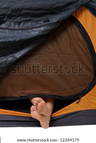 resting in tent with feet outside