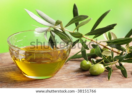 Olive oil with olive branch