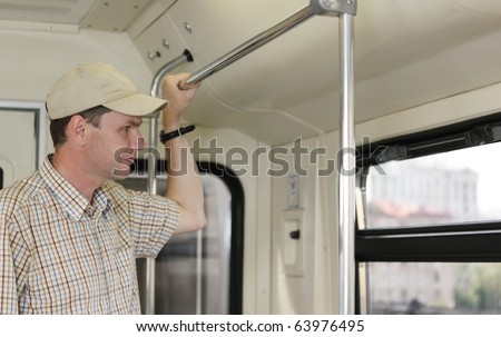 Man in the train of fast transit system