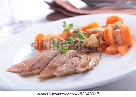Duck breast with baked apple and carrot
