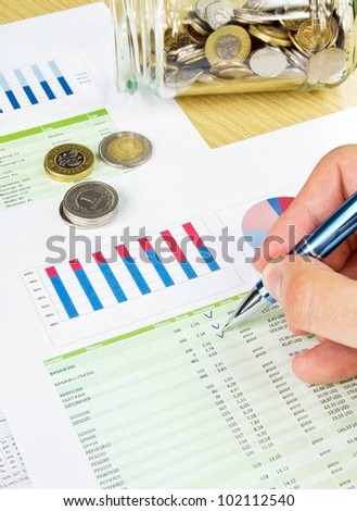 Coins, jar on colorful business background