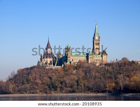 Parliament Hill in Ottawa, the capital city of Canada.  Shows centre block of parliament with the Peace Tower and the Library.