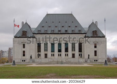 Supreme Court building in Ottawa, capital of Canada.  Overcast weather.  Front view.