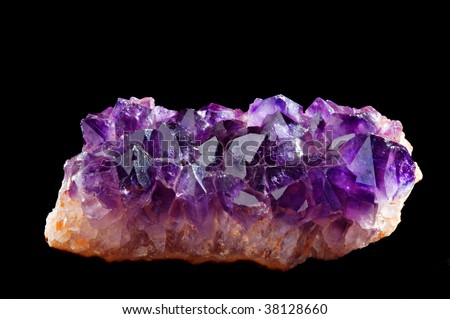 slab of amethyst geode with deep purple color; isolated on black
