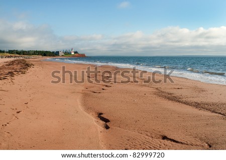 View along the beach to the lighthouse at Panmure Island, Prince Edward Island