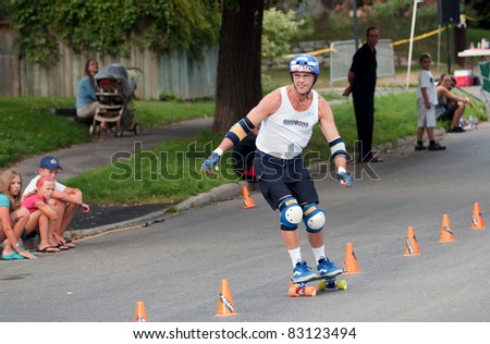 OTTAWA, ONTARIO, CANADA - AUG 19: Keith Hollien wins the masters category in tight slalom skateboarding in Ottawa, Ontario, Canada at the World Slalom Skateboarding Championships on August 19, 2011.
