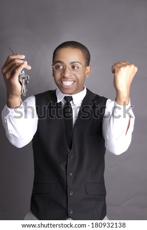 African American man excited about his new car keys