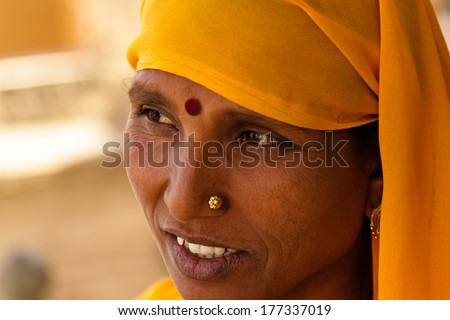 JAIPUR, INDIA Ã¢Â?Â? MARCH 3: An unidentified woman in Agra Fort on March 3, 2012 in Jaipur, Rajasthan, Northern India. Amber Fort overlooks Maota Lake and is 11km from Jaipur.