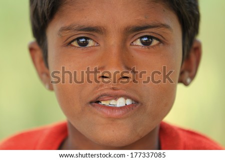 NIMAJ BAGH, INDIA Ã¢Â?Â? FEBRUARY 28: An unidentified boy inside the village of Nimaj Bagh, Rajasthan, Northern India on FEBRUARY 28, 2012. The village has just been opened up to boutique tourism.