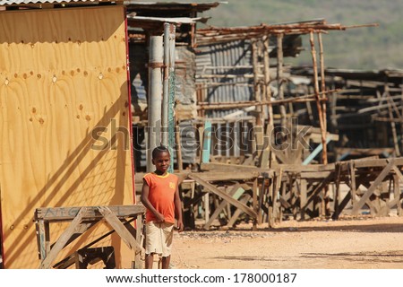 FALMOUTH, JAMAICA Ã¢Â?Â? MAY 11: Unidentified boy in shanty town outside the port of Falmouth on MAY 11, 2011 in Jamaica.