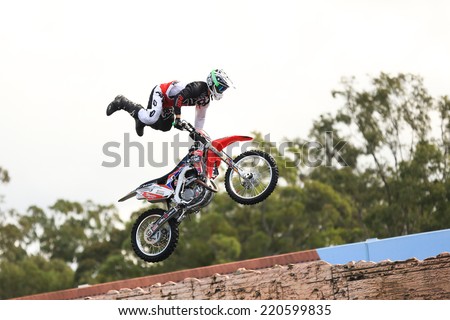 Gold Coast, Australia Ã?ÃÂ¢?? September 19, 2014: Motorcycle Making Jump in Air at Movieworld near Southport on AustraliaÃ?ÃÂ¢??s Sunshine Coast